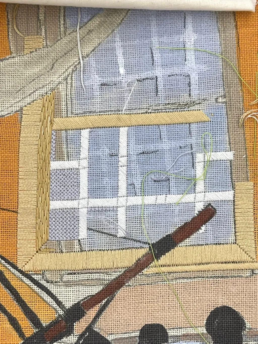 Mary Tod and Amy Helsel work on the panel