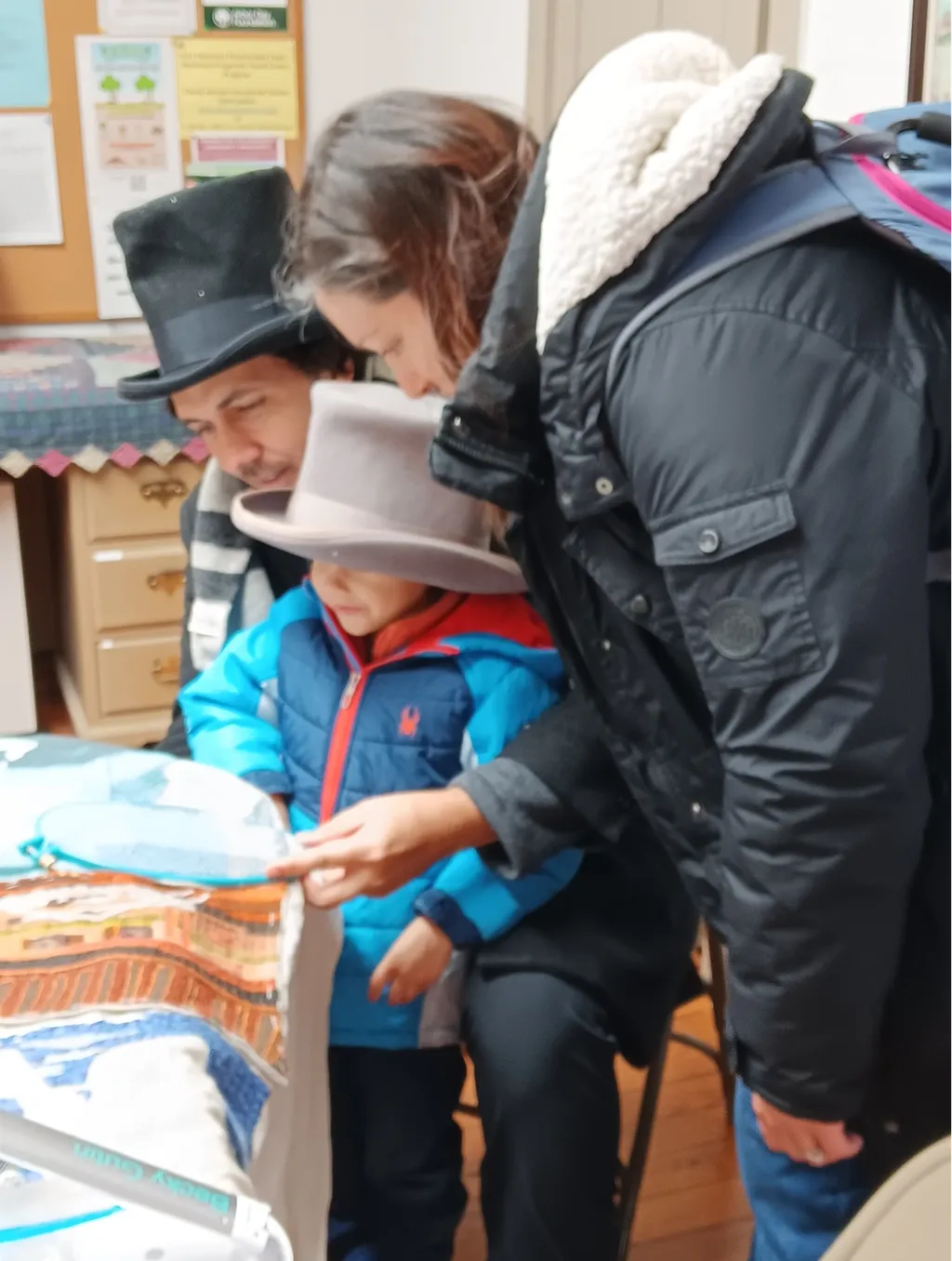 Visitors of all ages took a stitch on the Delaware panel