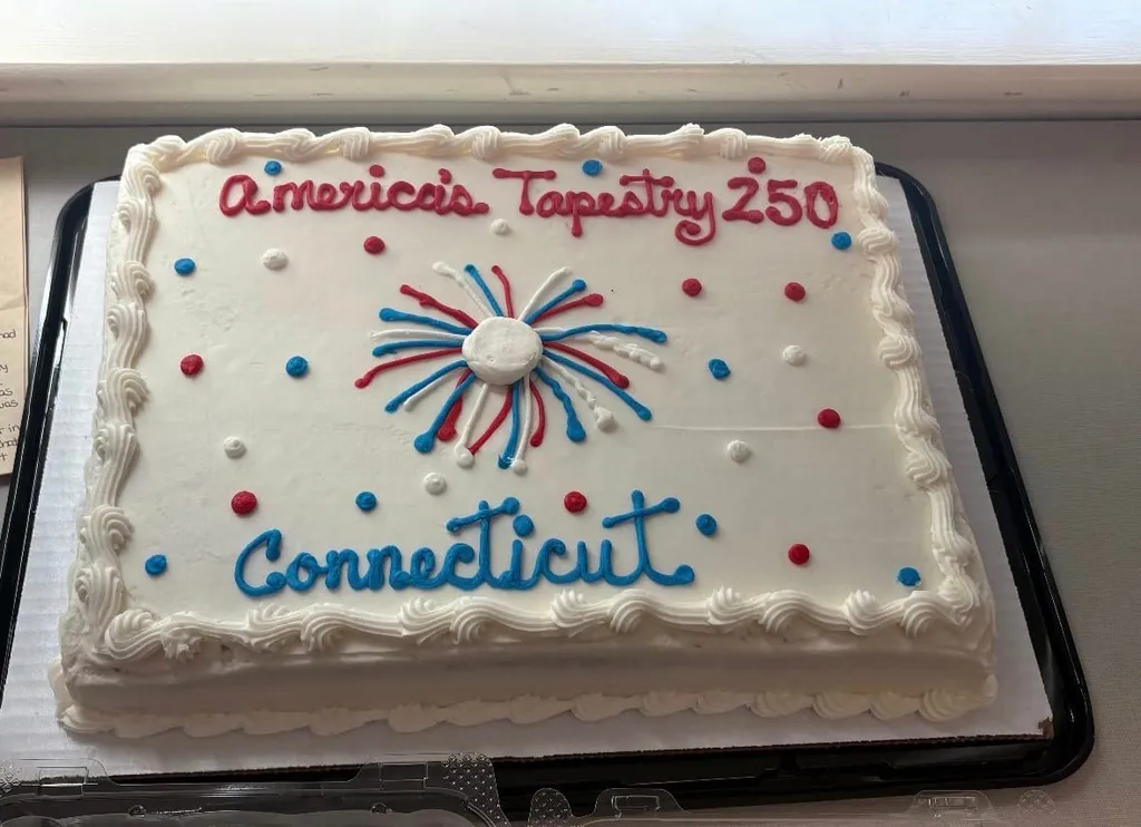 Connecticut volunteers gather to celebrate the finished panel